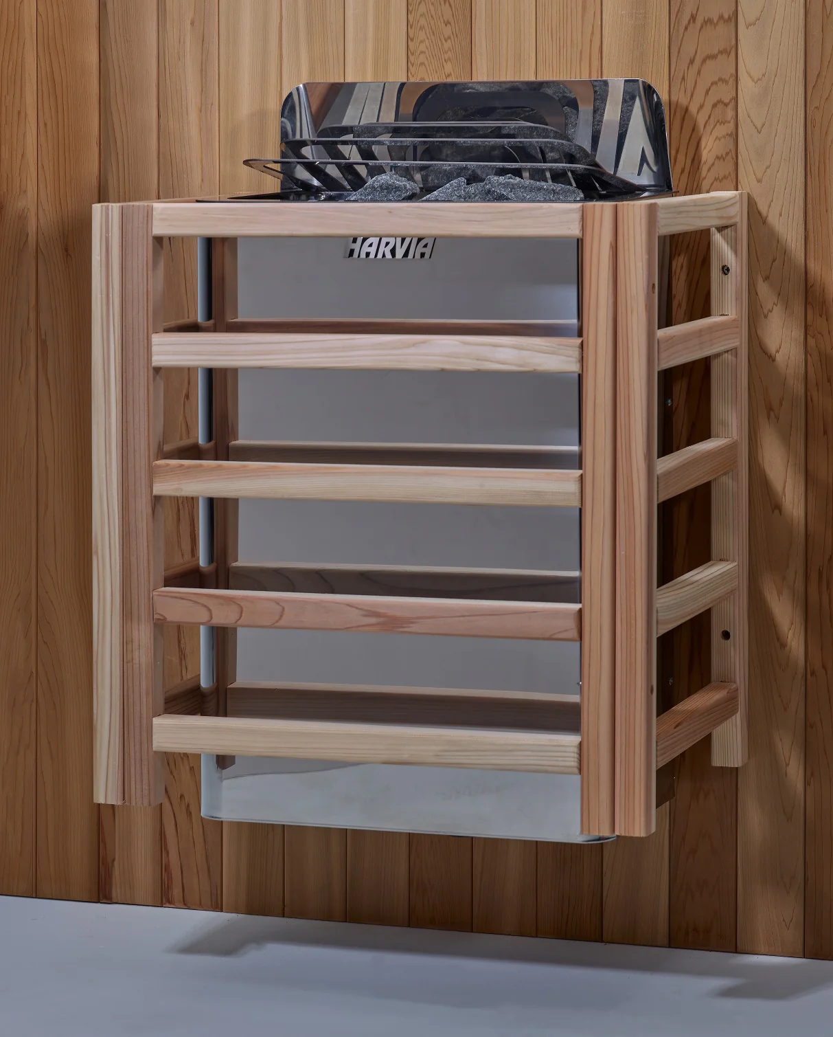 Wooden wall-mounted shelf with slatted design.