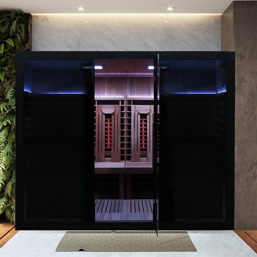 Modern wine cellar with illuminated racks and dark glass doors.
