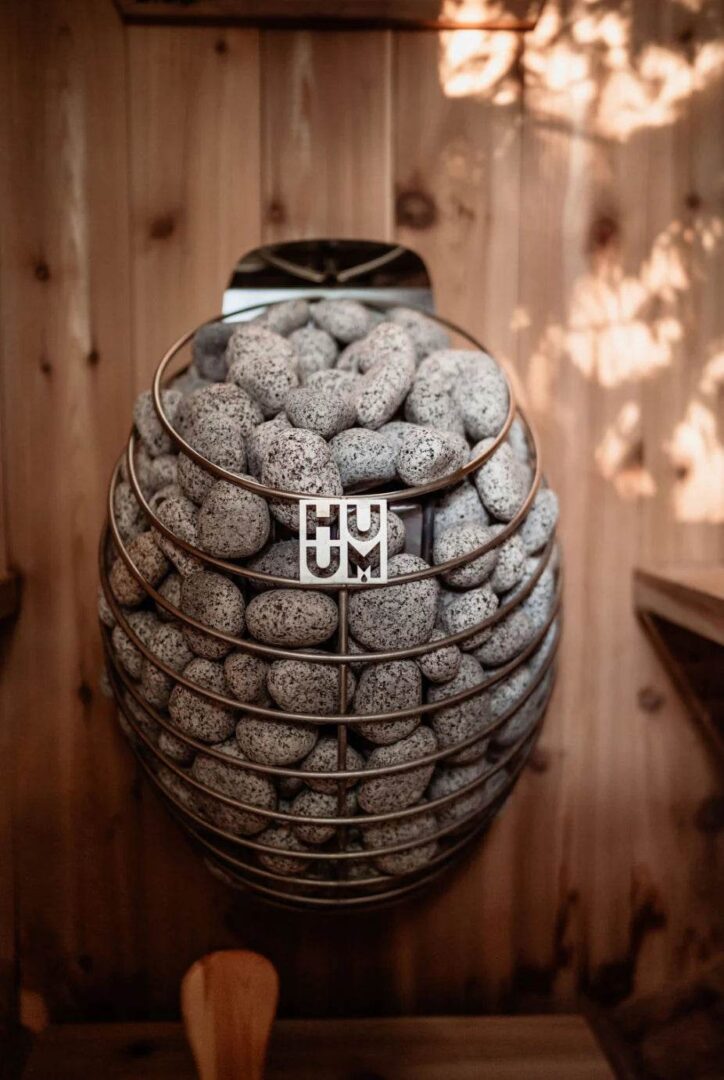 Large jar filled with white powdered cookies labeled HUMM.