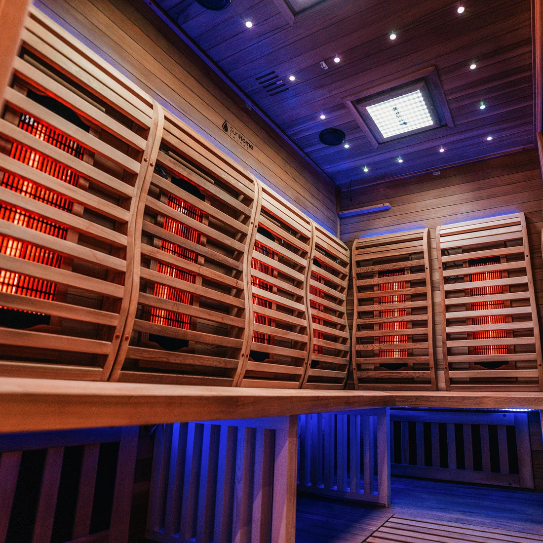 Luxurious wine cellar with wooden racks and ambient lighting.
