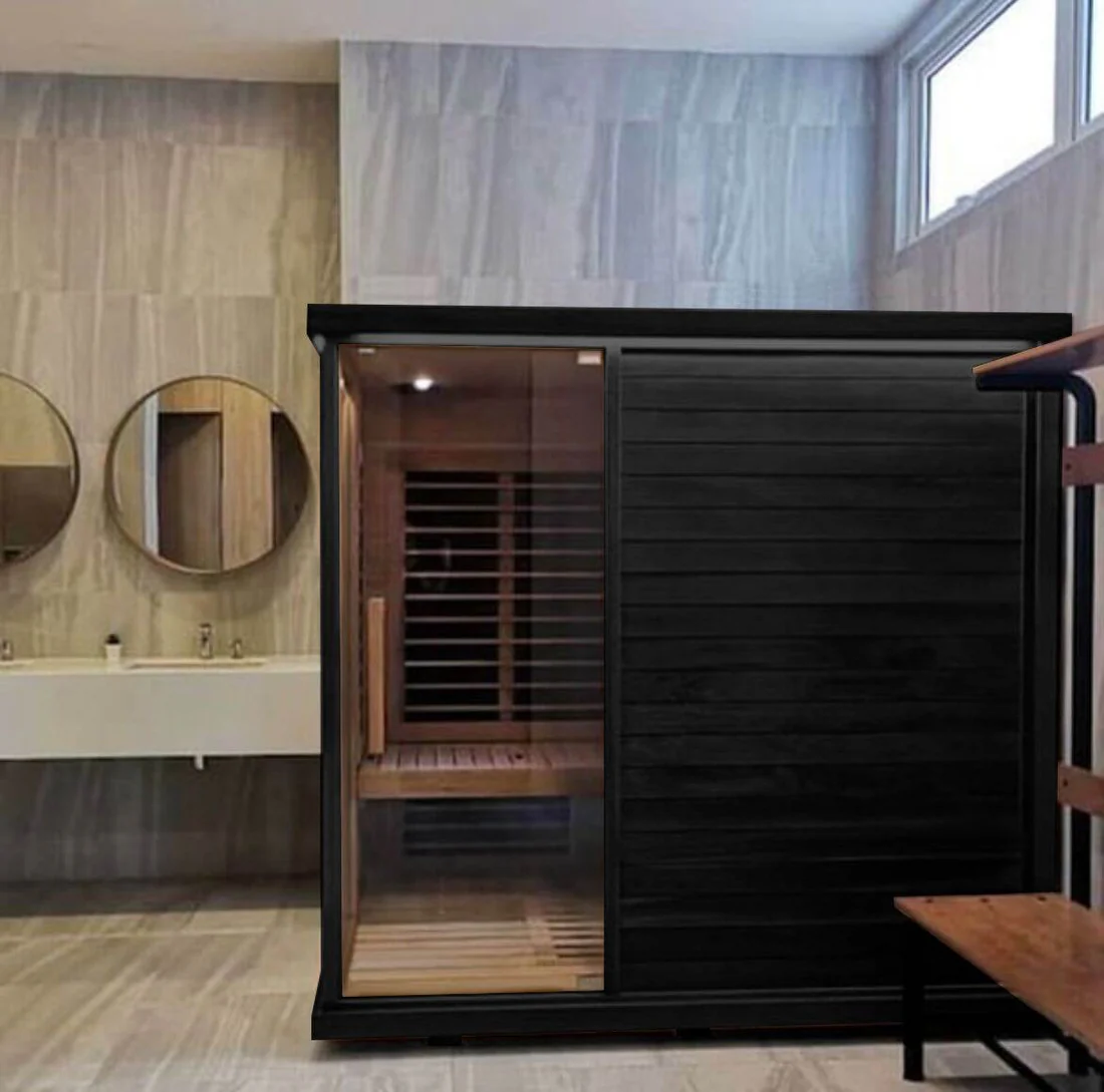 Modern wooden sauna room with glass door in a sleek bathroom.