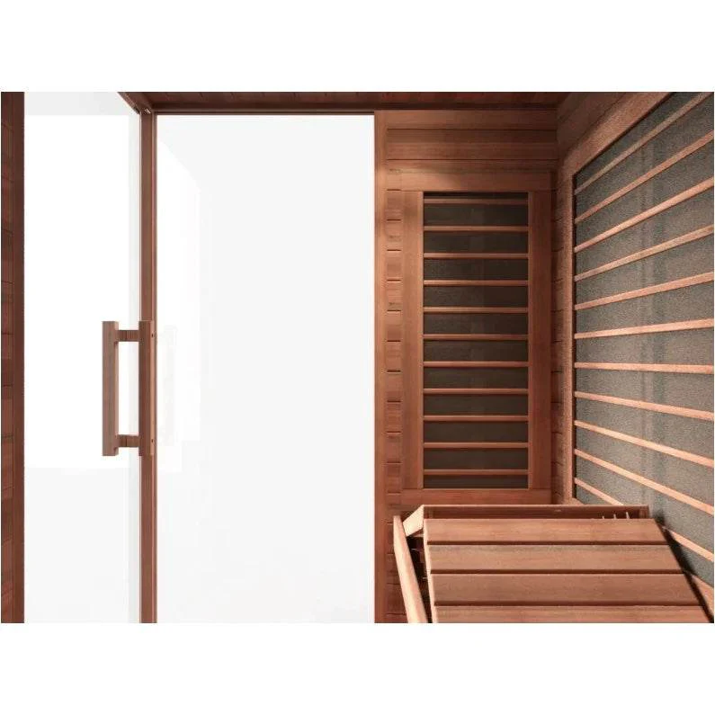 Modern sauna room with wooden benches and glass door.