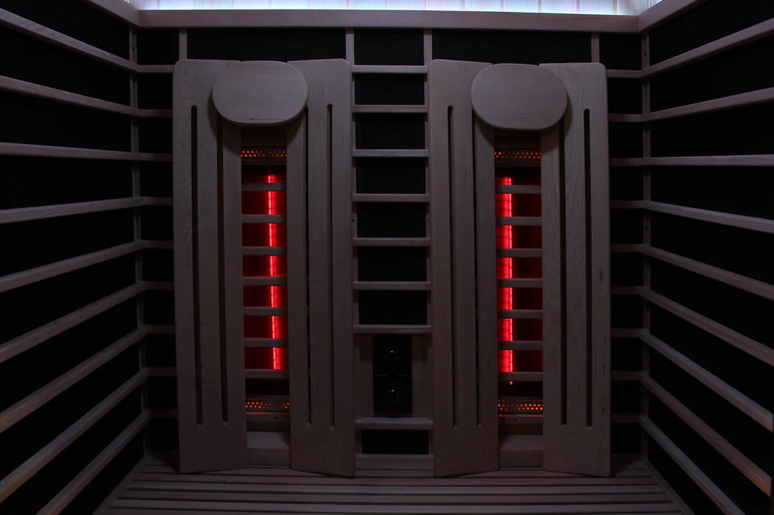 Futuristic wall panel with red glowing vertical lights and dark geometric design.