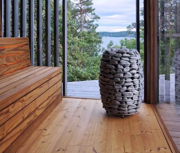 Modern wooden interior with stone sculpture by the window.