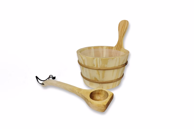 Traditional wooden sauna bucket and ladle set for pouring water.