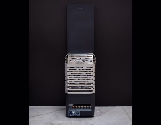 Tall black vending machine with white items inside and control panel at bottom.