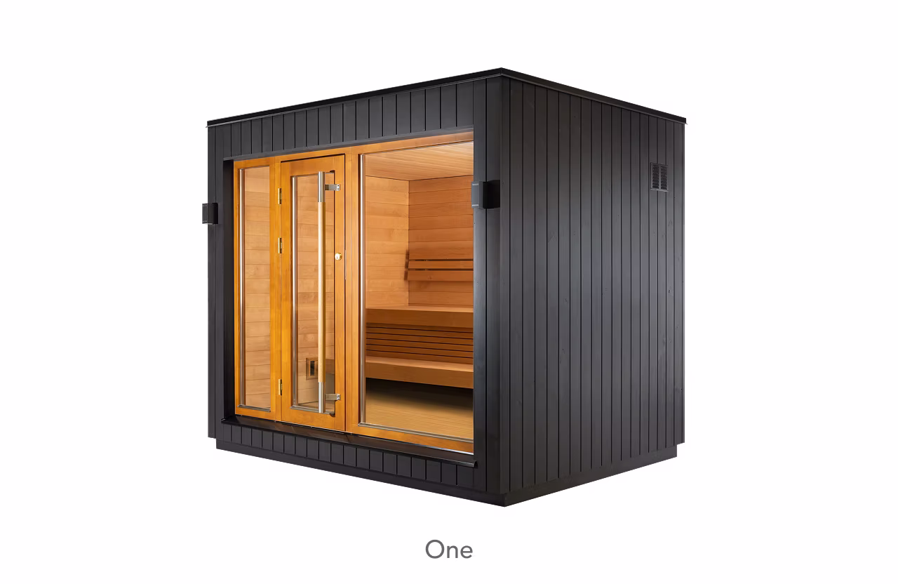 Modern black outdoor sauna with glass door and wooden interior.