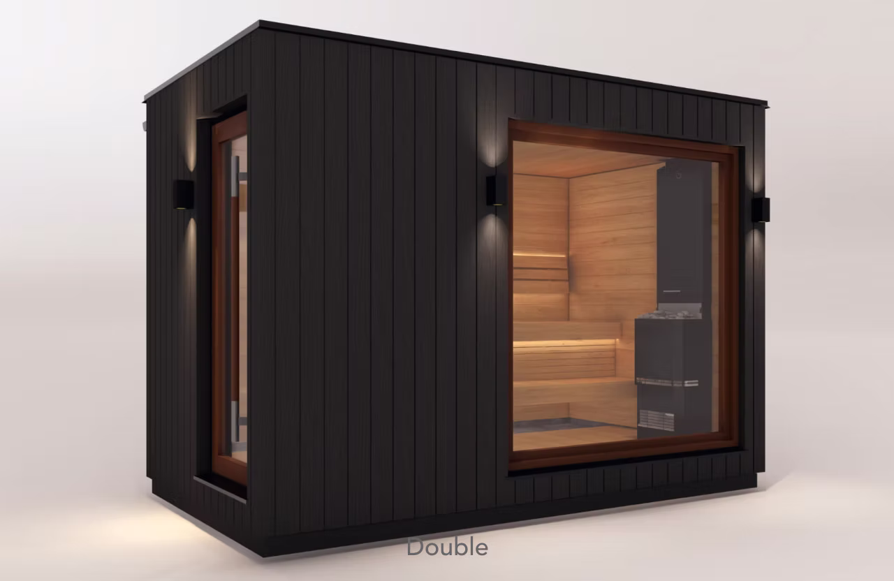 Modern black outdoor sauna with large glass window and warm wooden interior.