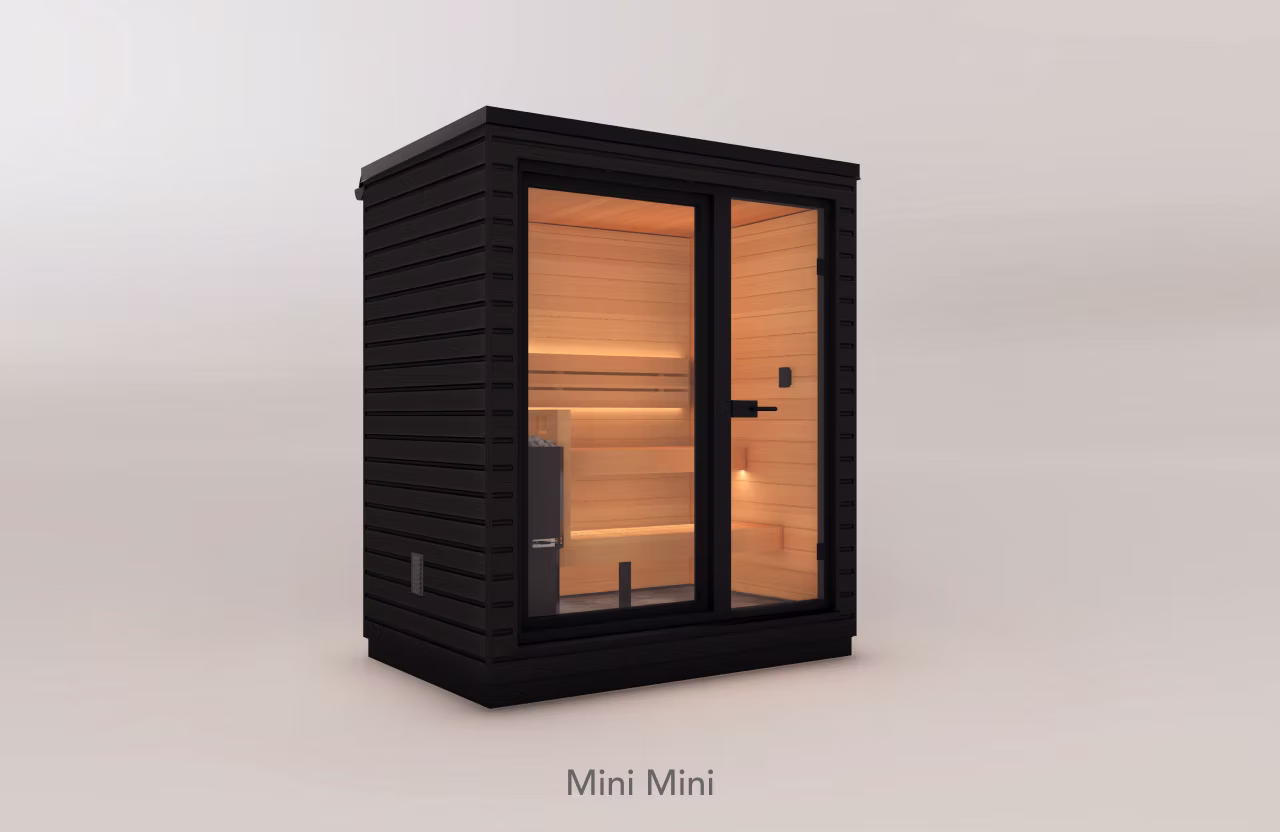 Compact black wooden sauna with glass door and interior bench.