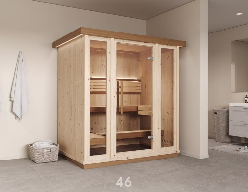 Modern wooden sauna with glass doors in a minimalist room.