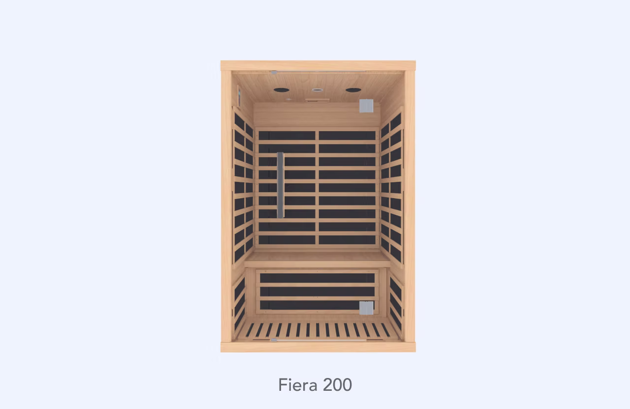 Modern wooden sauna room with bench and black heating panels.