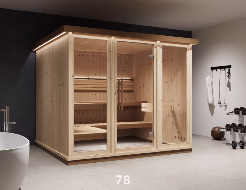 Modern wooden sauna with glass doors and interior lighting.