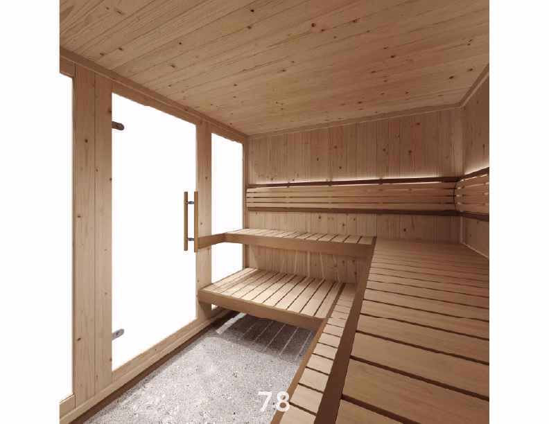 Cozy wooden sauna with benches and natural light.