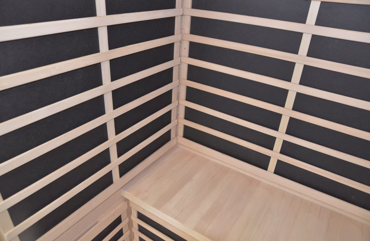 Minimalist wooden corner bench with horizontal slats.